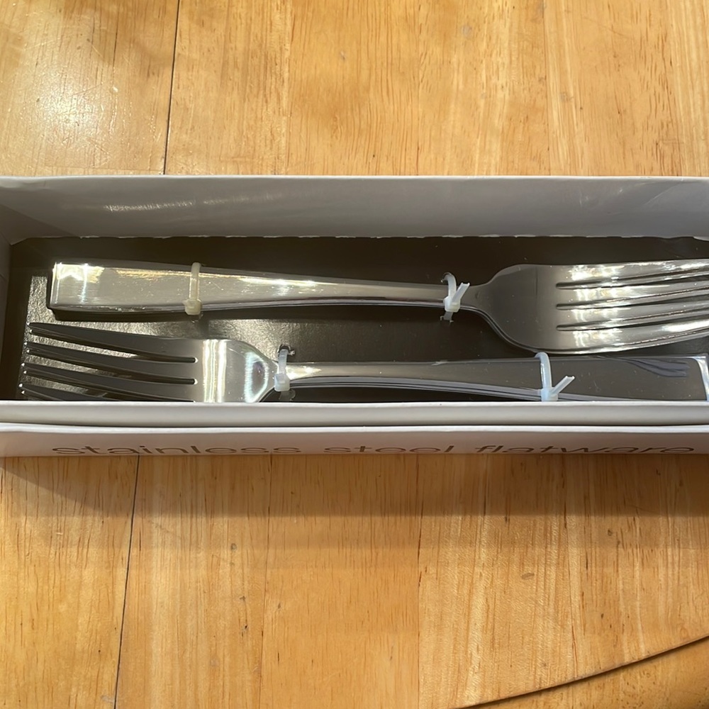 Dinner forks Stainless Steel. Brand new.  Lowered from $6.00 a box to $4.00